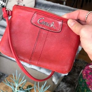 Coach wristlet in red.